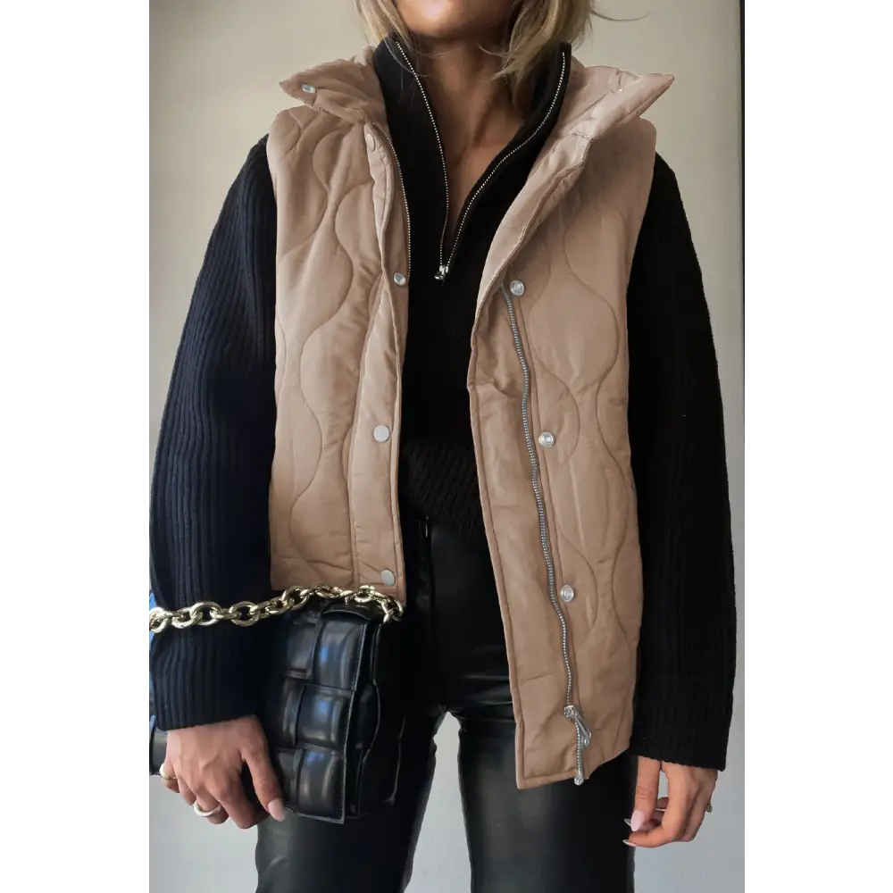 Elevate your style with the timeless collared neck vest and pockets $42.99 pocketed for ultimate convenience and style,