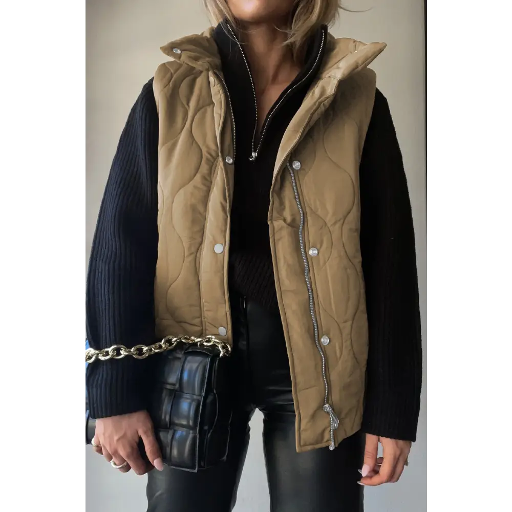 Elevate your style with the timeless collared neck vest and pockets $42.99 pocketed for ultimate convenience and style,