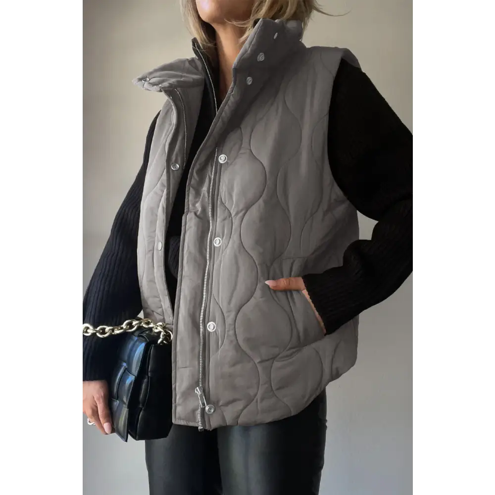 Elevate your style with the timeless collared neck vest and pockets $42.99 pocketed for ultimate convenience and style,