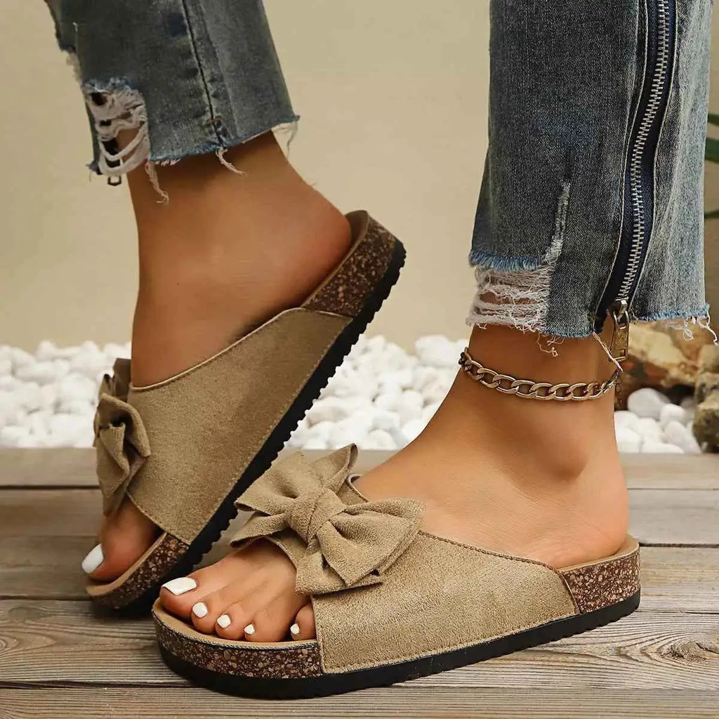 Comfortable Bow Decor casual sandals in beige polyester with rubber sole and large bow detail on top, flat heel design