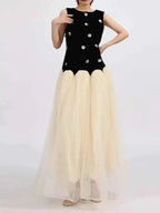 Contrast Flower Sleeveless black sleeveless top dress with floral applique and cream tulle maxi skirt, ruched and zipped design