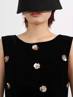 Contrast Flower Sleeveless black tulle dress with metallic floral embellishments and sleeveless design
