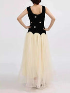 Contrast Flower Sleeveless black and white tulle maxi dress with sleeveless ruched bodice and floral appliques