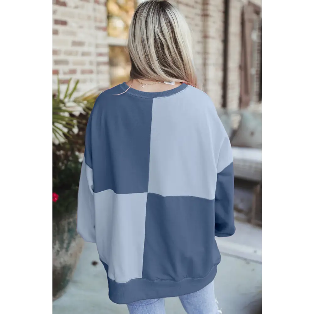 Elevate your wardrobe with the contrast half button long sleeve sweatshirt $39.99 high-low design, perfect