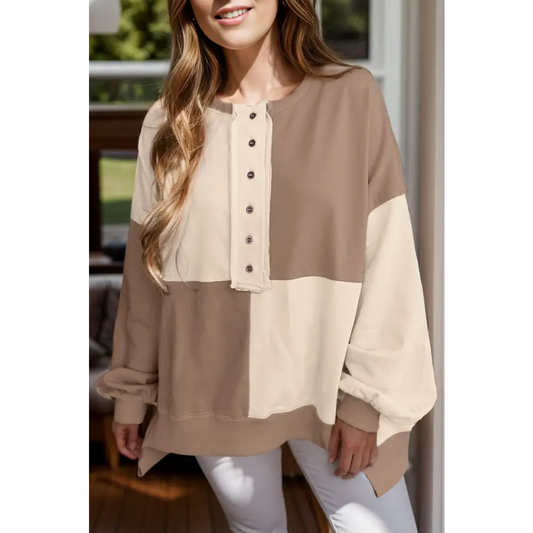 Elevate your wardrobe with the contrast half button long sleeve sweatshirt $39.99 high-low design, perfect