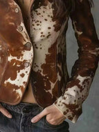 Cow Print Button Up Blazer in brown and cream polyester with buttoned front and animal pattern on fitted long sleeves
