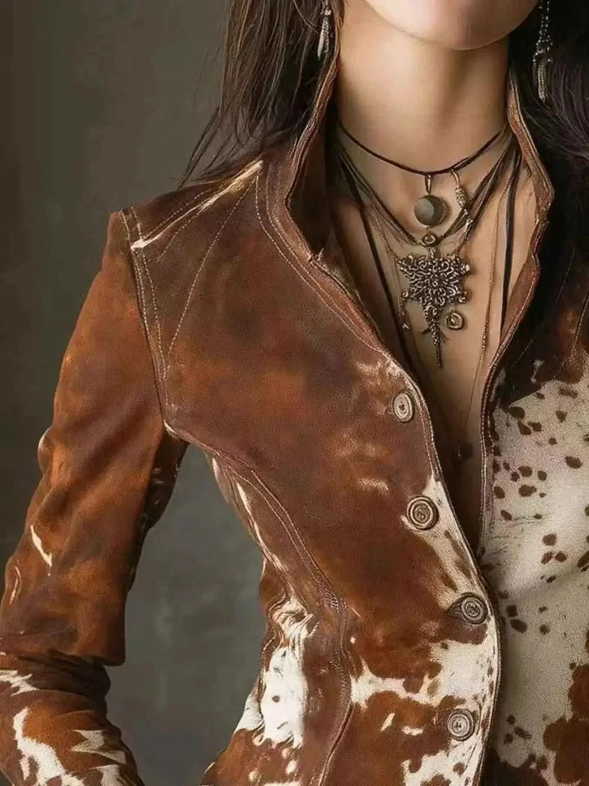 Cow Print Button Up Blazer featuring a brown and white cowhide pattern with buttons down the front and tailored fit