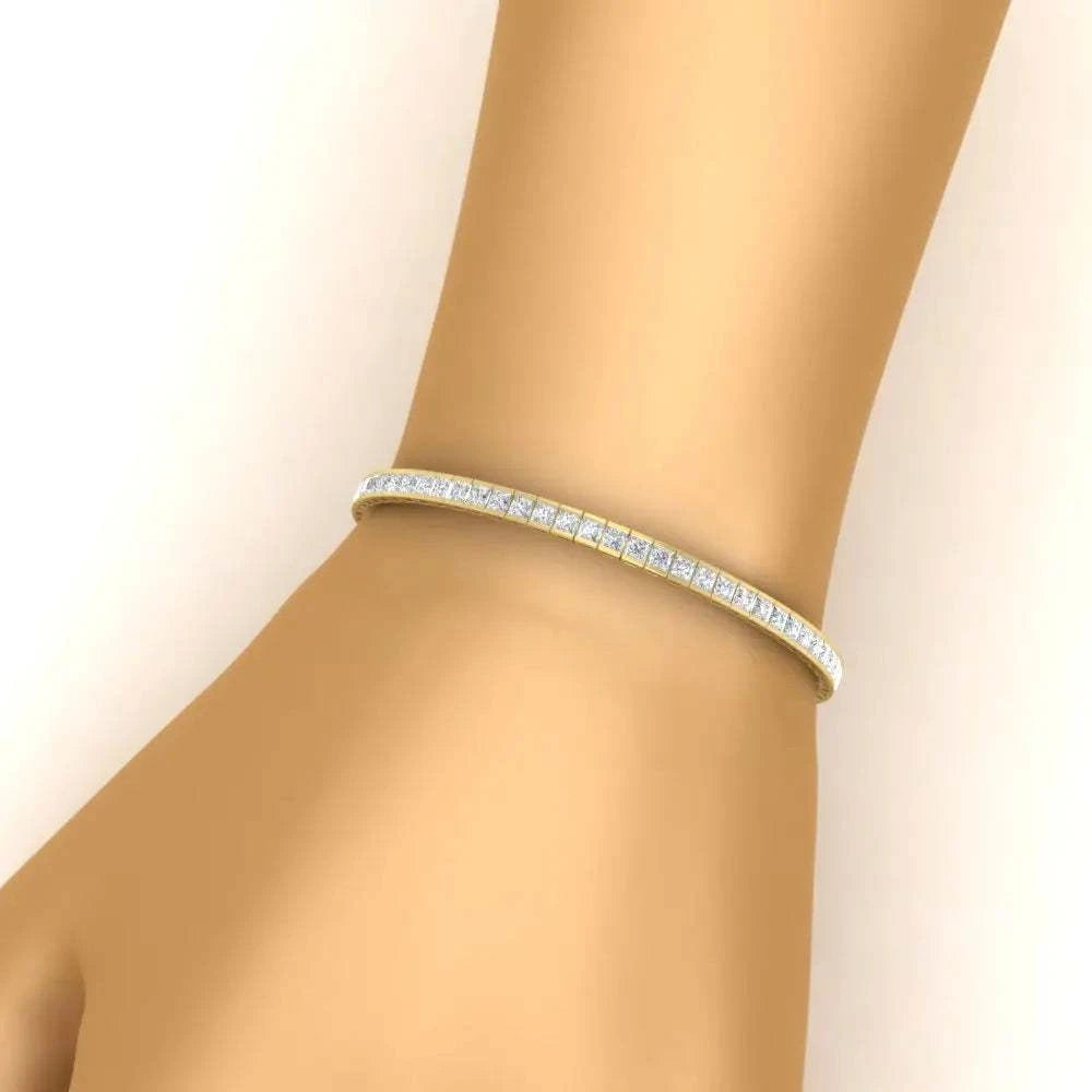 Created Moissanite 14K gold over sterling silver tennis bracelet with princess cut stones in a half bezel setting