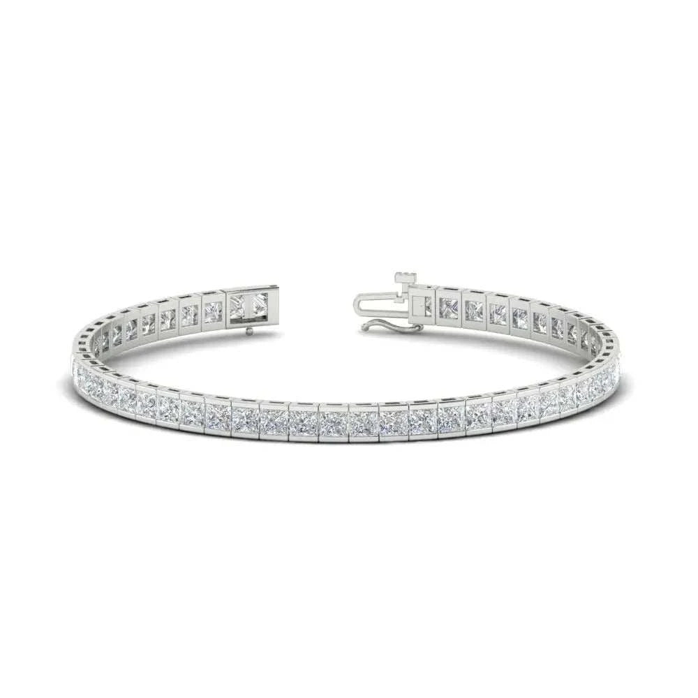 Created Moissanite half bezel tennis bracelet in 14K white gold over sterling silver with princess cut stones