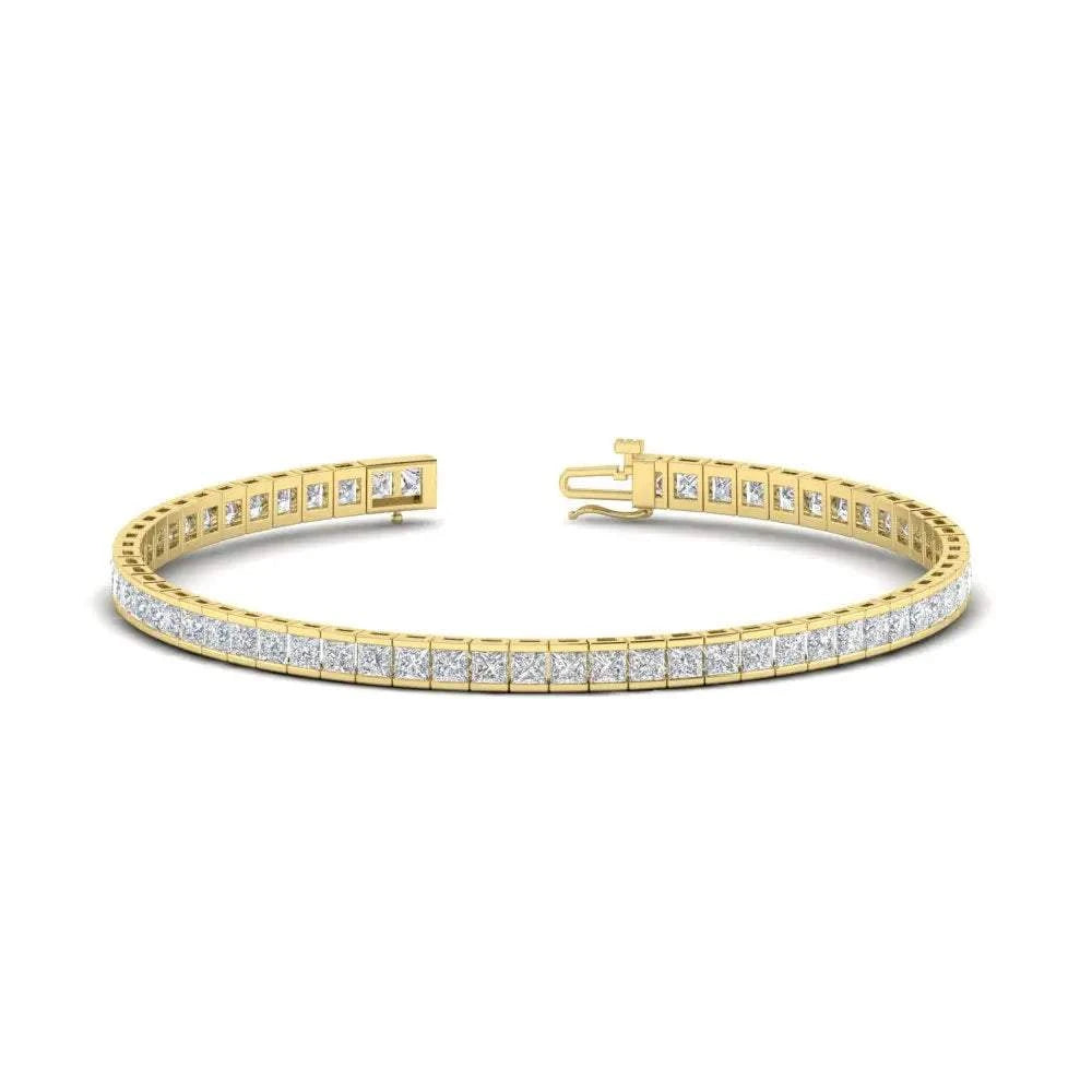 Created Moissanite princess cut tennis bracelet in 14K yellow gold over sterling silver with half bezel setting and sparkling stones