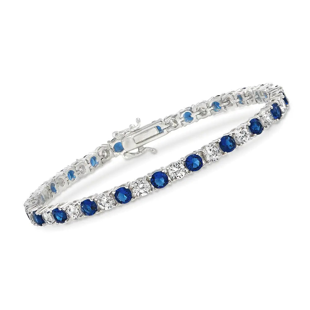 Created White & Blue Sapphire tennis bracelet with alternating blue and white round gemstones in silver-tone metal with box clasp