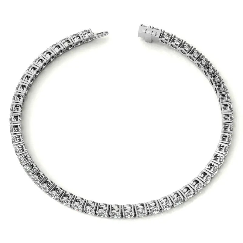 Created White Sapphire tennis bracelet in 14K white gold overlay with 3mm round stones in secure 4-prong settings