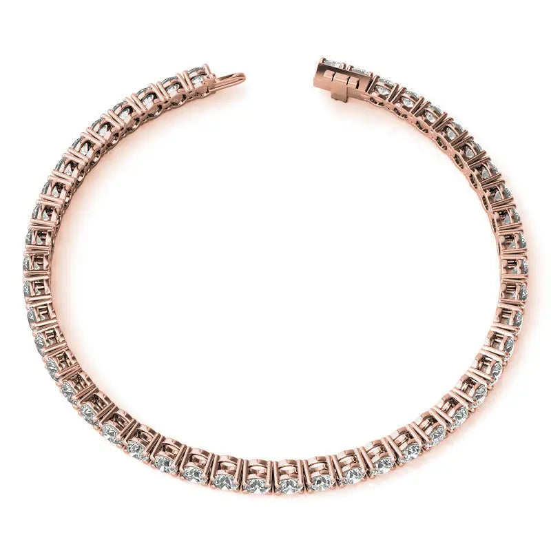 Created White Sapphire tennis bracelet with 3mm round stones set in 14K rose gold overlay, classic 7-inch design