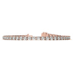 Created White Sapphire tennis bracelet with 3mm round stones set in rose gold overlay featuring secure clasp