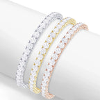Created White Sapphire tennis bracelets in 14K white, yellow, and rose gold overlay with 3mm round stones in secure prong settings