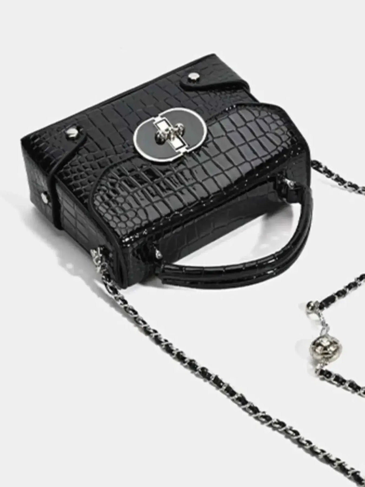 Small black PU leather crossbody bag with Crocodile Pattern Flap and silver-tone turn-lock closure and chain strap