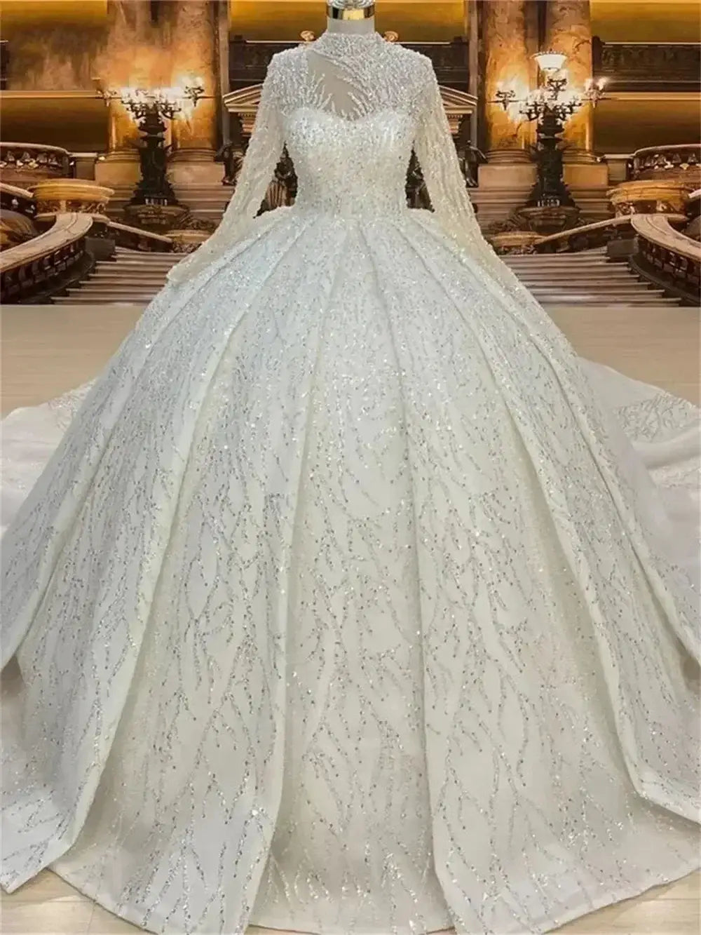 Custom High Neck Ball Gown in white lace with intricate beading, long sleeves, and a full ball gown silhouette