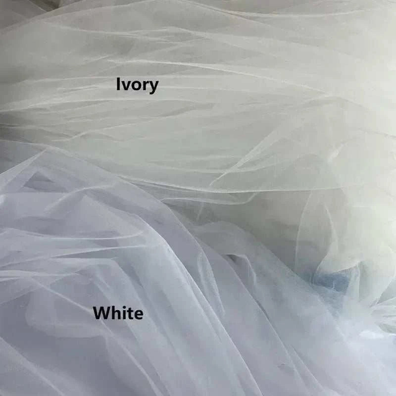 Customized Wedding Dress tulle fabric in ivory and white colors for bridal gowns, soft sheer material ideal for elegant designs