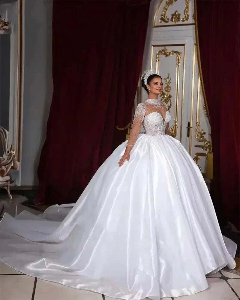 Customized Wedding Dresses white satin ball gown with high neck, long sleeves, pearl embellishments, and chapel train