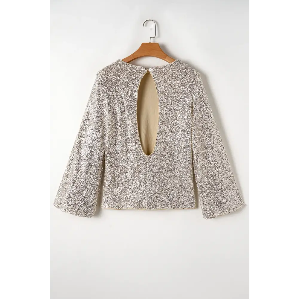 Elegance redefined with cutout sequin long sleeve blouse in luxury fashion $41.99 cutout design and dazzling sequin