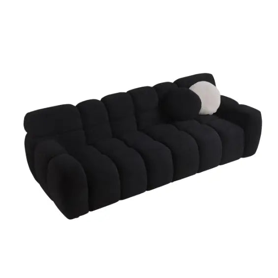 Elegant black boucle sofa for timeless designer living spaces