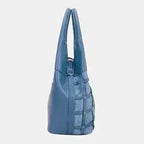 David Jones Rivet Handbag in blue PU leather with textured woven front panel and rivet accents, medium tote shape