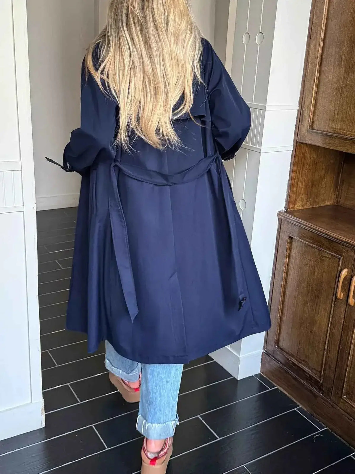 Double-Breasted Belted Trench Coat in dark navy polyester fabric with back belt detail and long sleeves