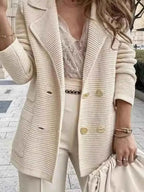 Double-Breasted Textured Jacket in cream with ribbed knit fabric, gold buttons, and a tailored fit on a woman
