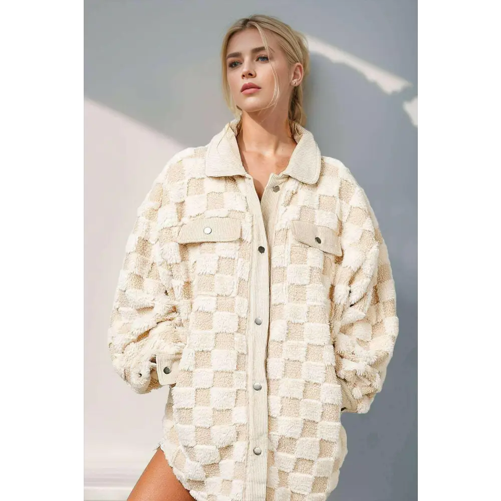 Elevate your style with the fuzzy checkered shacket in luxury fashion $64.99 pocketed, buttoned, exuding a touch