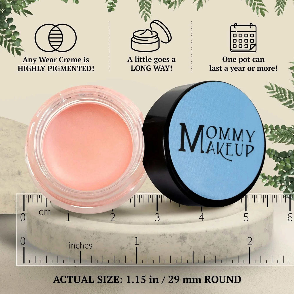 Duchess any wear creme in a clear glass jar with black lid contains soft peach waterproof multi-tasking creme-to-powder product for lips cheeks and eyes