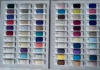 Elegant Lace Wedding Dress fabric color swatches featuring various shades including purples, blues, pinks, greens, whites, and neutrals in a sample book