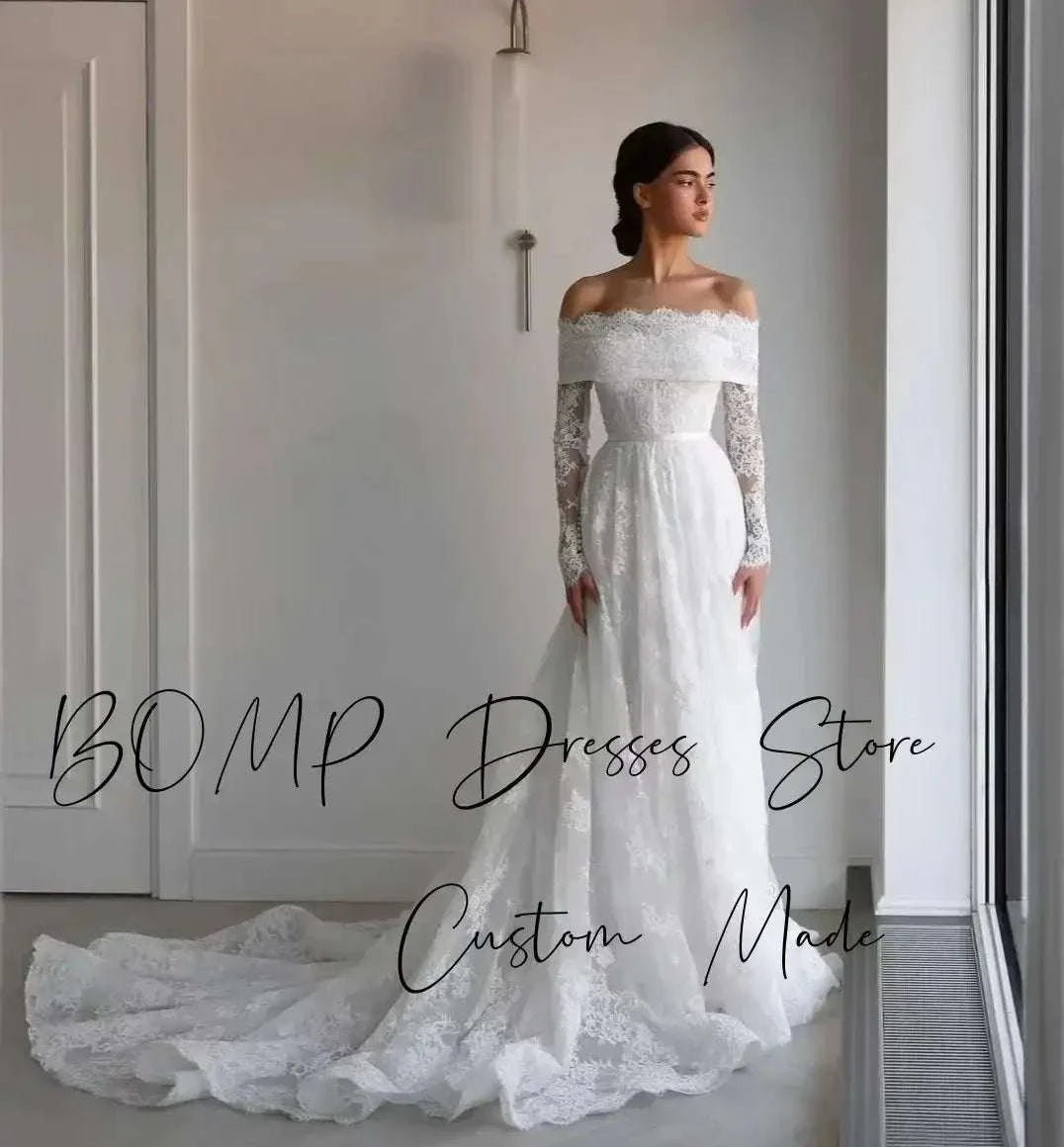 Elegant Lace Wedding Dress in ivory featuring off shoulder neckline, full lace sleeves, A-line silhouette, and long sweep train