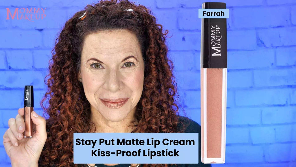 Farrah Stay Put matte lip cream in warm nude shade with black cap, held by woman with curly red hair and matching lip color