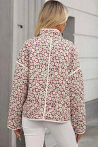 Floral Snap Down coat in white and pink with a daisy floral pattern, mock neck, and long sleeves shown from back