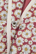 Floral Snap Down coat with white daisy print on pink fabric, featuring silver snap buttons and cream trim edges