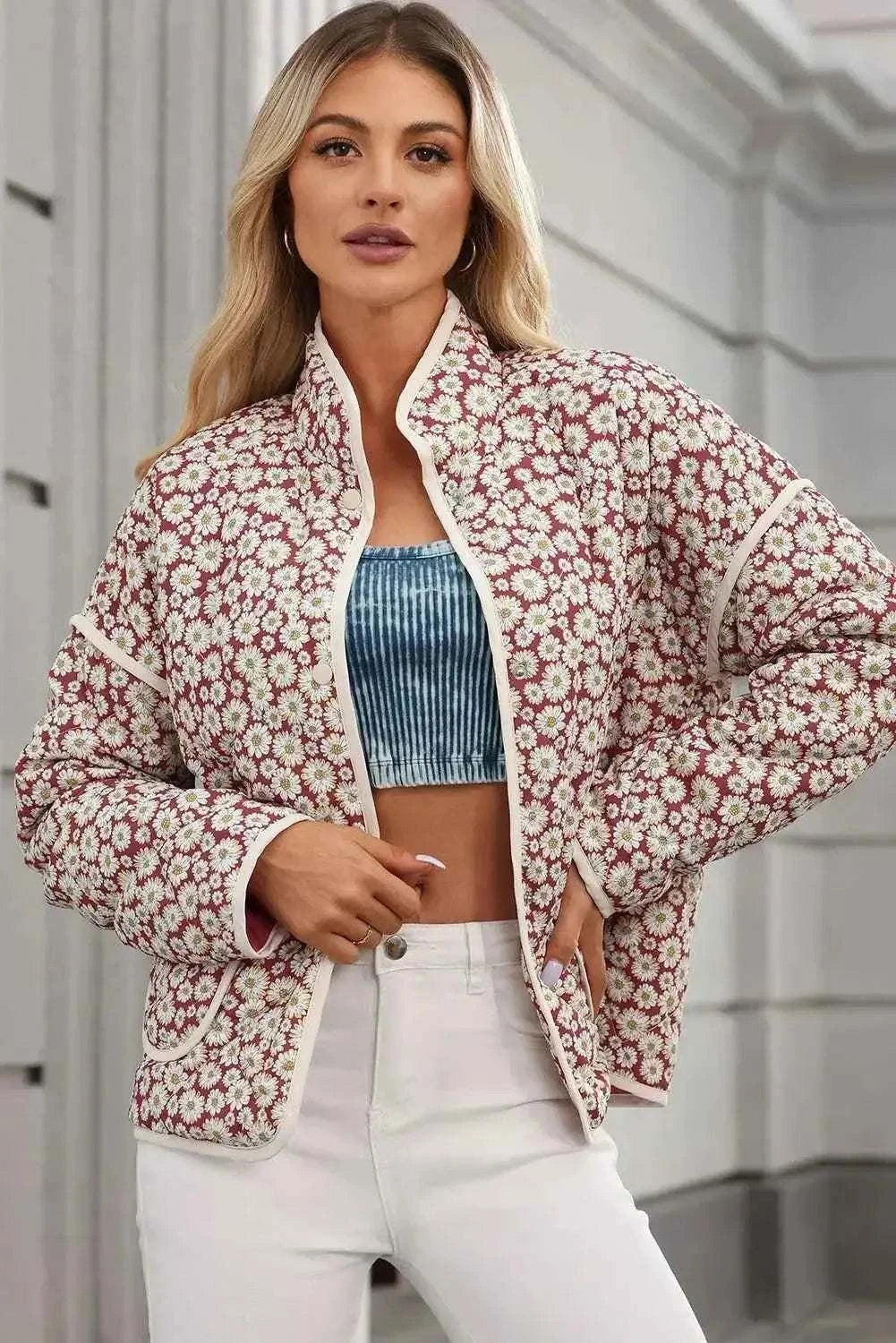 Floral Snap Down mock neck coat with red and white floral pattern on polyester fabric, pocketed and long-sleeved.