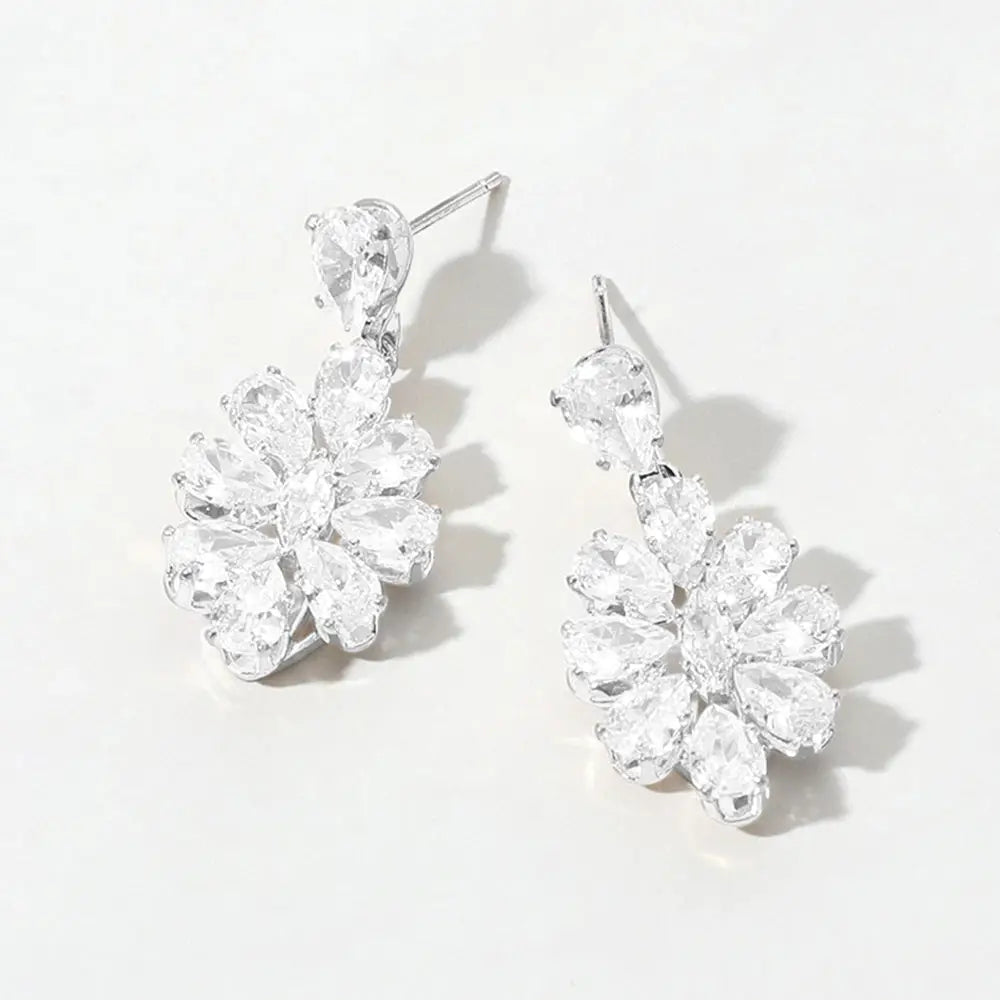 Flower CZ Stone dangle earrings with clear cubic zirconia stones arranged in a floral cluster design on silver-tone metal