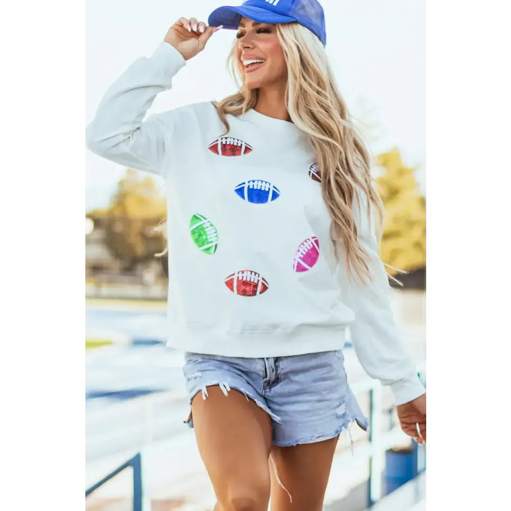 Elevate your wardrobe with the timeless designer football sweatshirt $45.99 indulge in the glamor of shimmering sequins