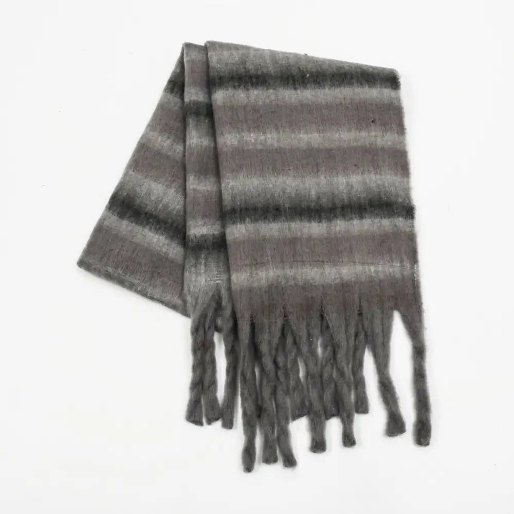 Fringe contrast striped scarf for luxury fashion and timeless elegance $20.99 1-piece 100% polyester imported product