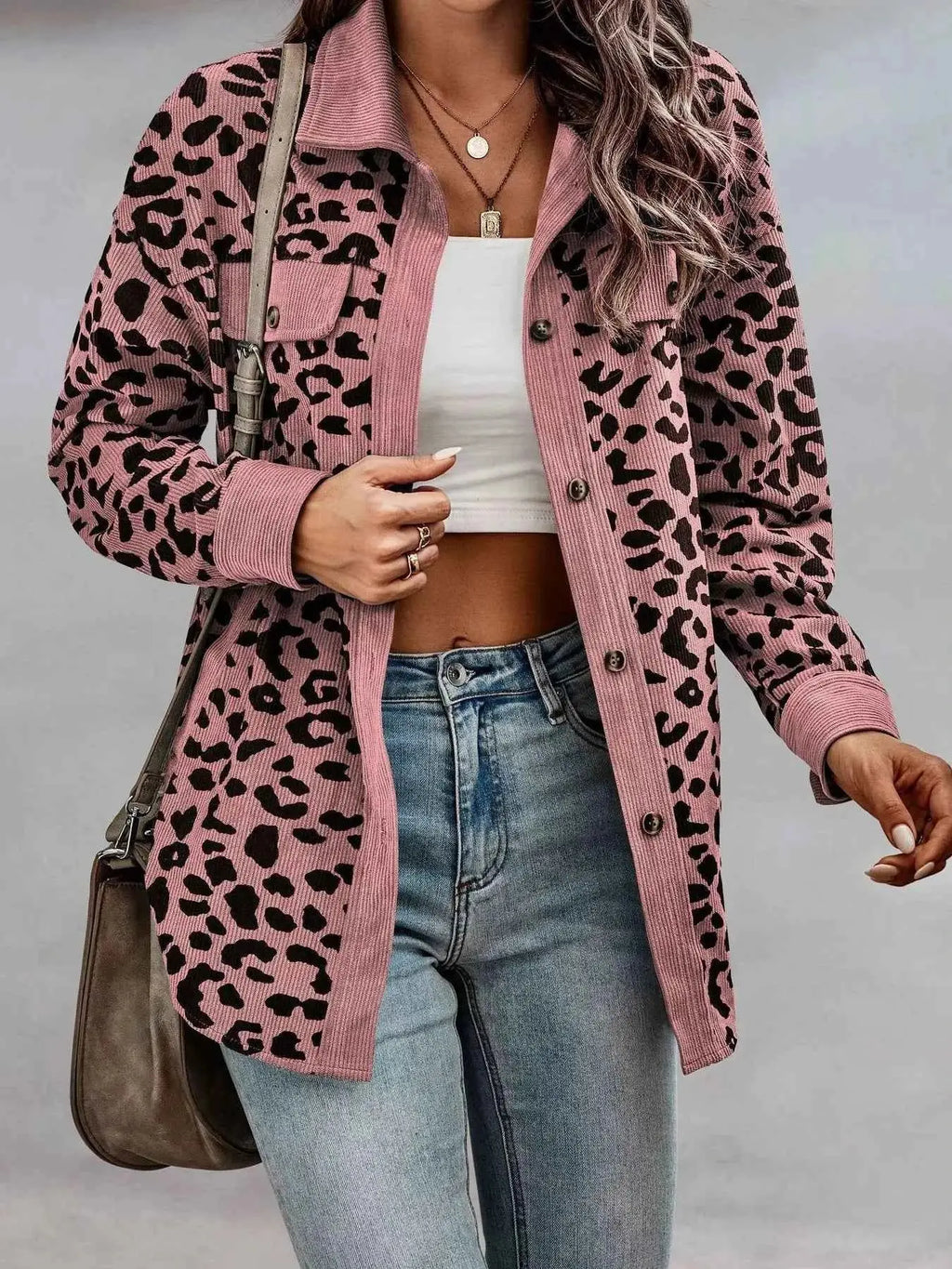 Full Size Leopard Print button-down jacket in pink with black leopard spots, featuring long sleeves and chest pockets