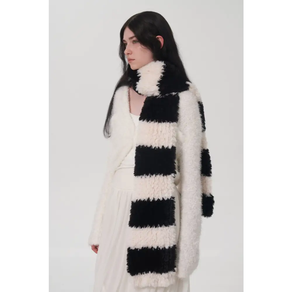 Elevate your look with the fuzzy contrast striped scarf in luxury fashion $27.99 1-piece polyester imported experience