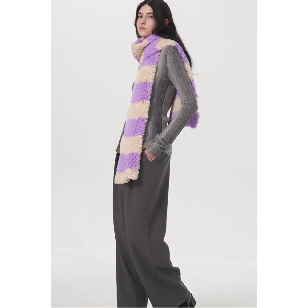 Elevate your look with the fuzzy contrast striped scarf in luxury fashion $27.99 1-piece polyester imported experience