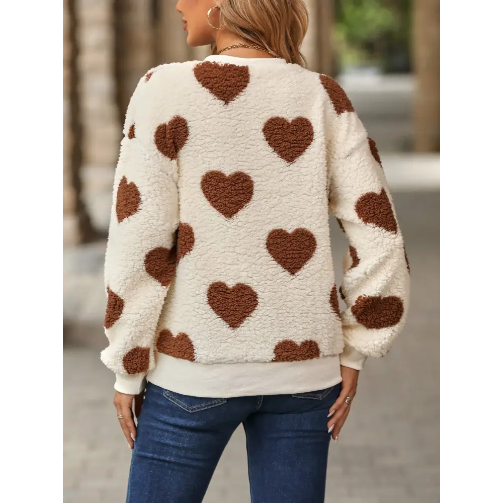 Fuzzy heart dropped shoulder sweatshirt in luxury fashion for women $27.99 embrace a basic yet effortlessly chic style