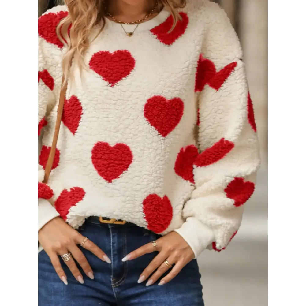 Fuzzy heart dropped shoulder sweatshirt in luxury fashion for women $27.99 embrace a basic yet effortlessly chic style