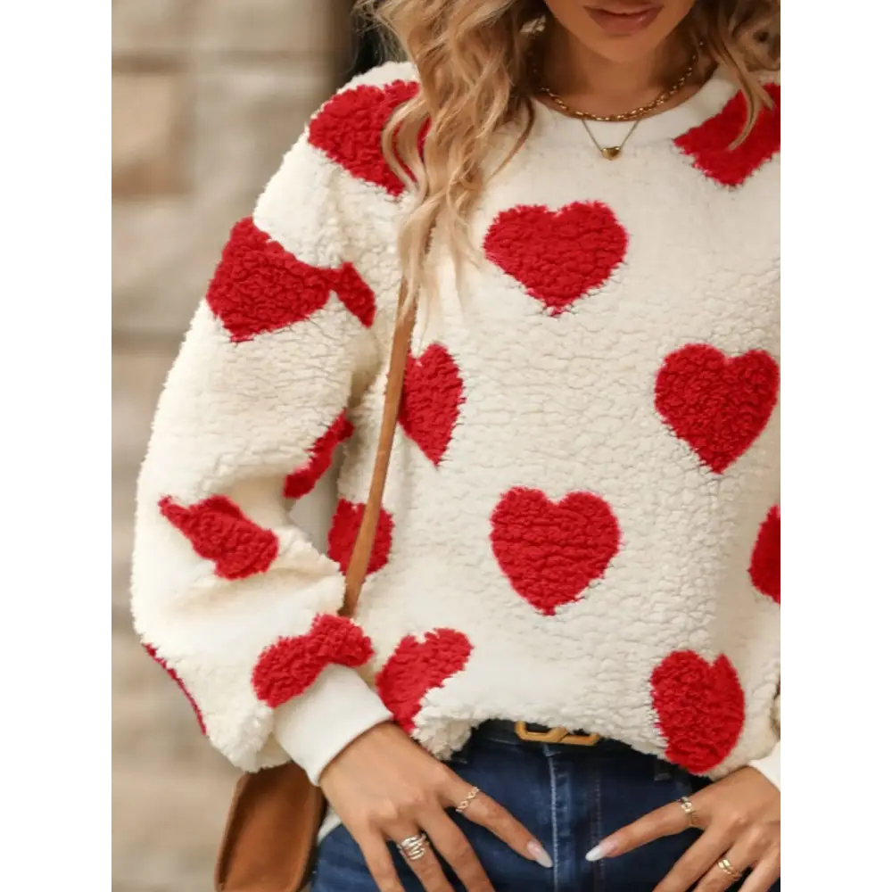 Fuzzy heart dropped shoulder sweatshirt in luxury fashion for women $27.99 embrace a basic yet effortlessly chic style