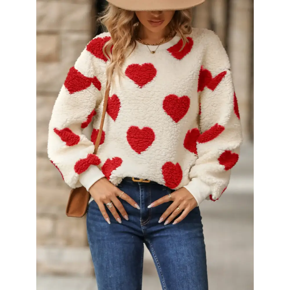 Fuzzy heart dropped shoulder sweatshirt in luxury fashion for women $27.99 embrace a basic yet effortlessly chic style