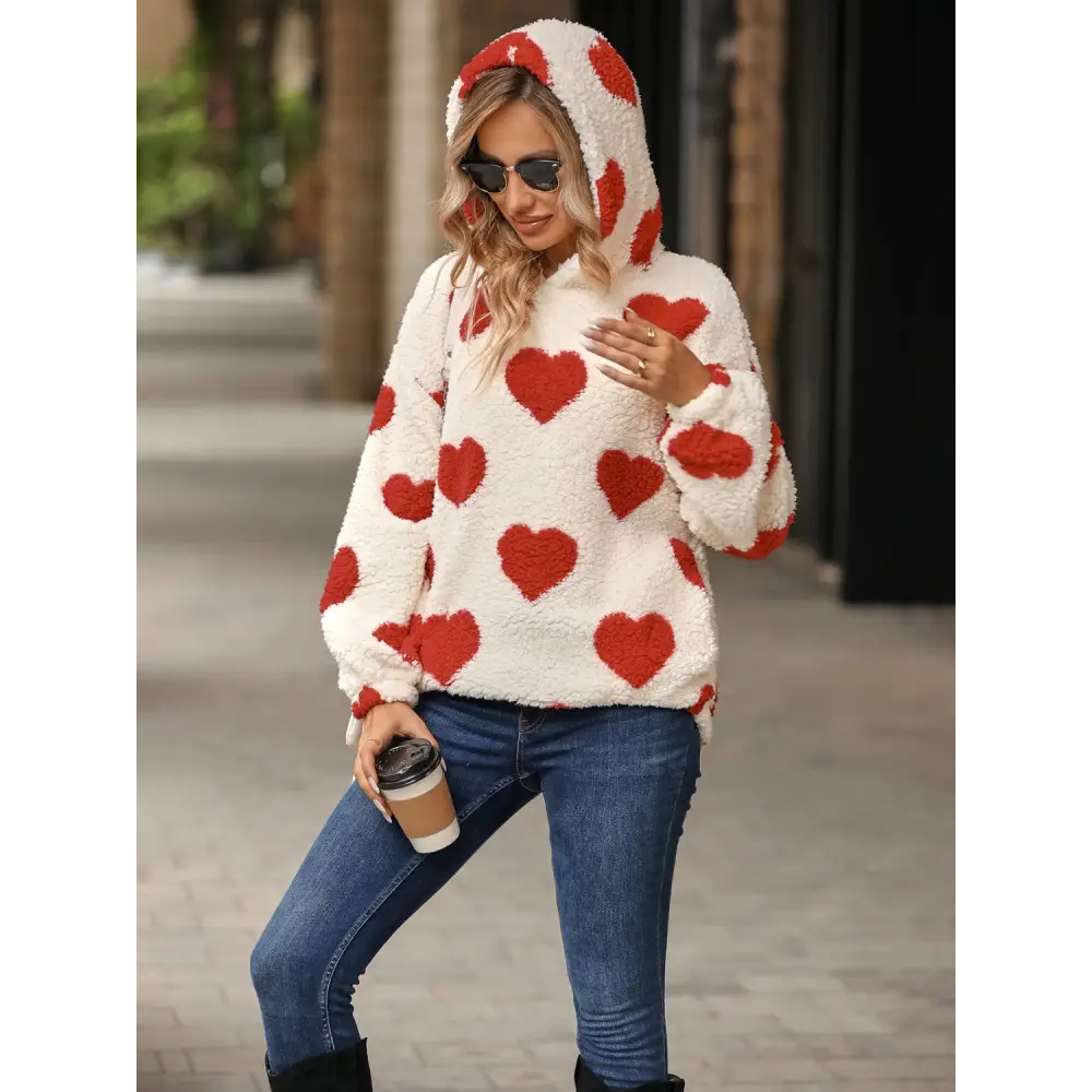 Fuzzy heart pocketed hoodie - a statement in luxury fashion for women $25.99 elevate your wardrobe with the chic