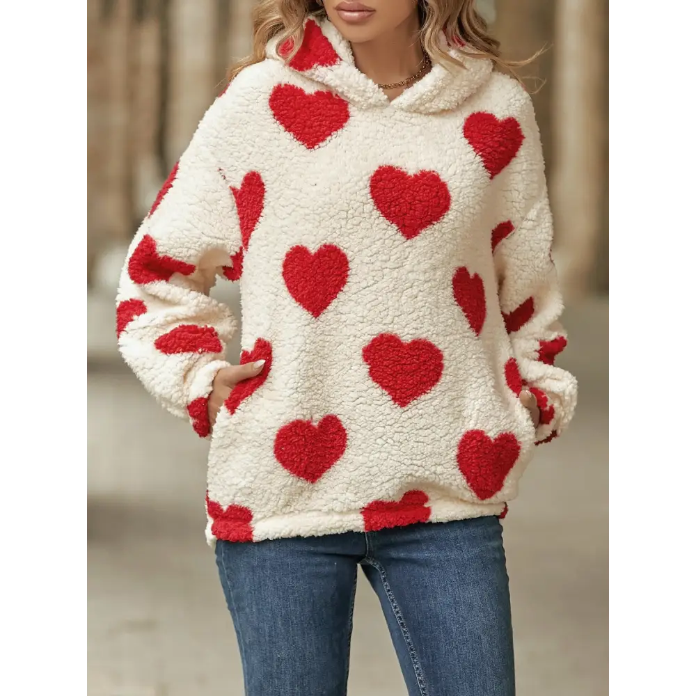 Fuzzy heart pocketed hoodie - a statement in luxury fashion for women $25.99 elevate your wardrobe with the chic