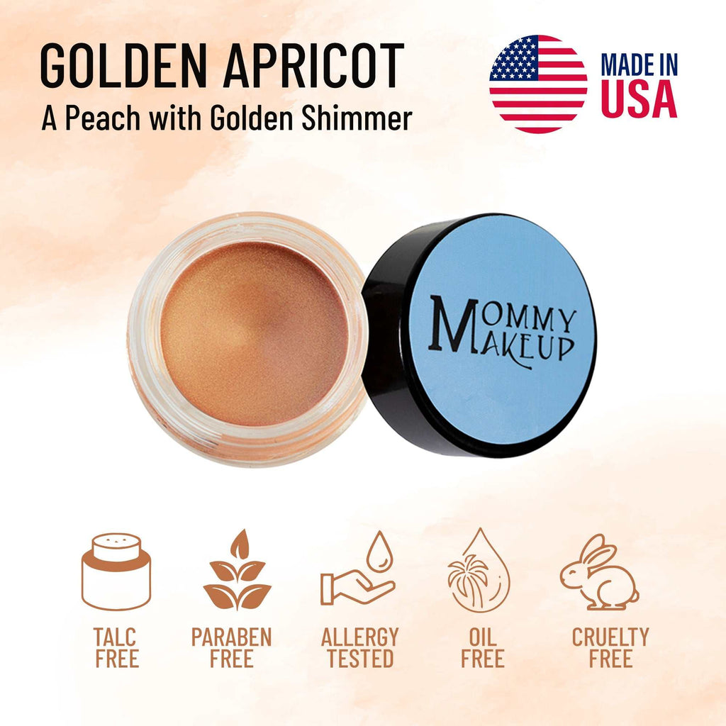 Golden Apricot waterproof multi-tasking creme to powder makeup in peachy golden shimmer with black and blue lid container