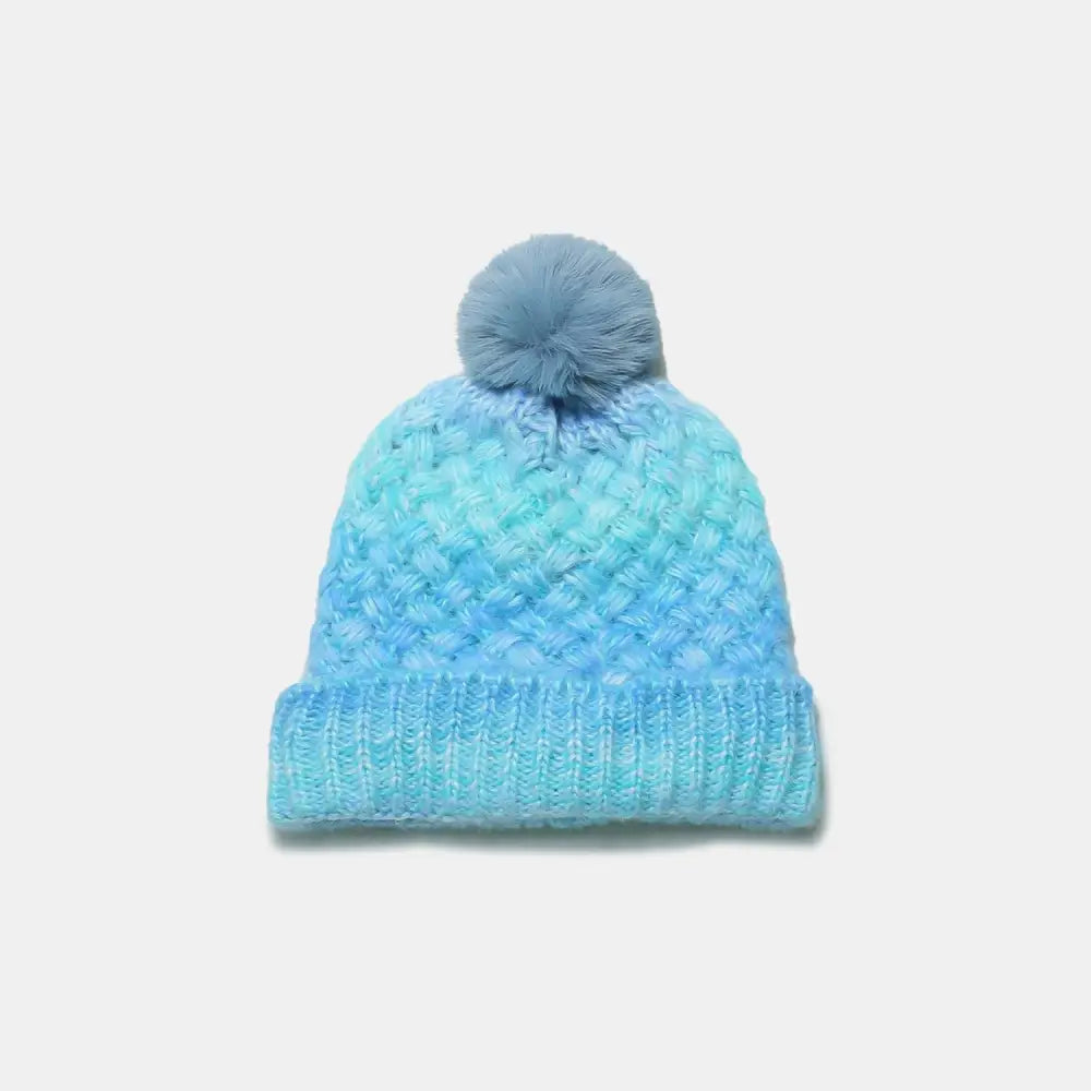 Chic gradient knit hat with pompom for luxury fashion enthusiasts $18.99 1-piece acrylic, polyester imported product